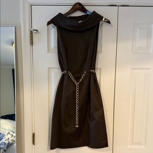 Elegant Brown Dress with Gold Chain Detail
